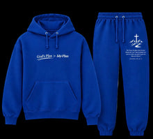 Load image into Gallery viewer, A two-piece matching hoodie and sweatpants set in royal blue. The hoodie features the text 'God's Plan > My Plan' printed in white on the left chest.