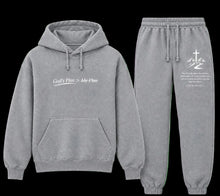 Load image into Gallery viewer, A two-piece gray hoodie and jogger sweatpants set. The hoodie features the text 'God's Plan > My Plan' printed in white on the left chest.